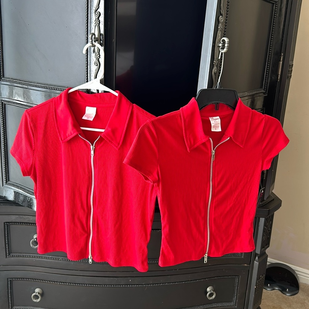 XS and L: Two matching zip up red polos, one XS, one L. XS has tags, L is NWOT.